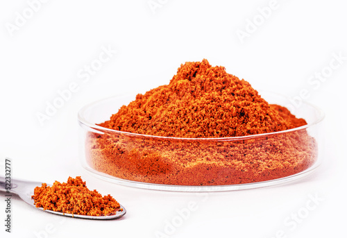 vibrant orange coloring pigment, obtained by dyes or additives, non-polymeric, isolated white background
