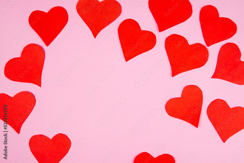 red hearts on a pink background