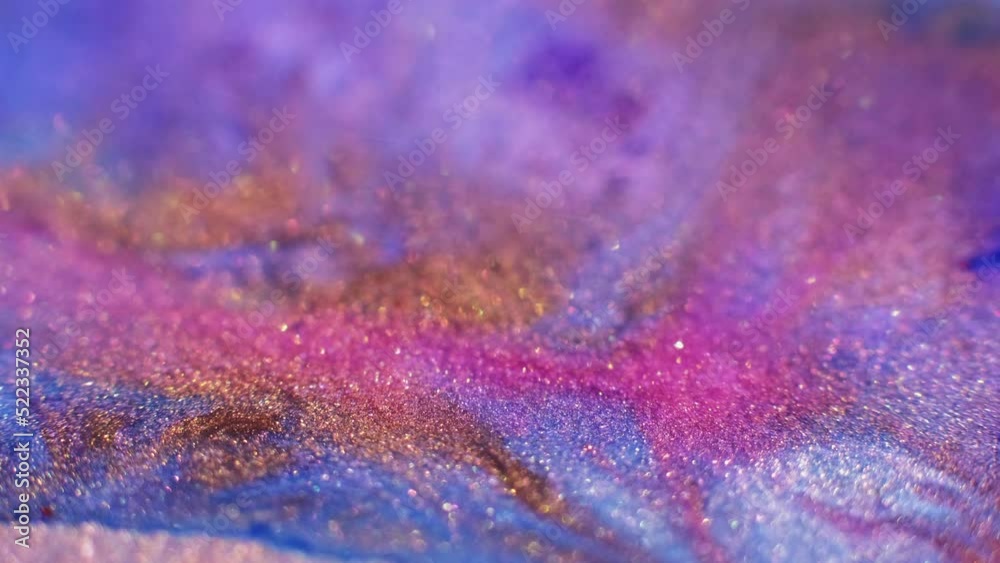 Glitter splash. Bokeh light texture. Magic gleam. Blur gold orange pink blue color shimmering circles floating on luxury abstract background. Glitter splash. Bokeh light texture. Magic gleam. Blur gold orange pink blue color shimmering circles floating on luxury abstract background.