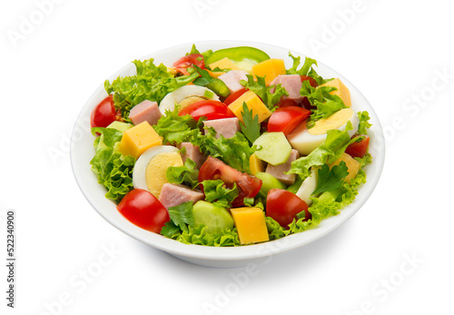 Chef salad with tomato, cucumber, lettuce, ham, bell pepper, cheese and eggs in a white bowl isolated on white background.