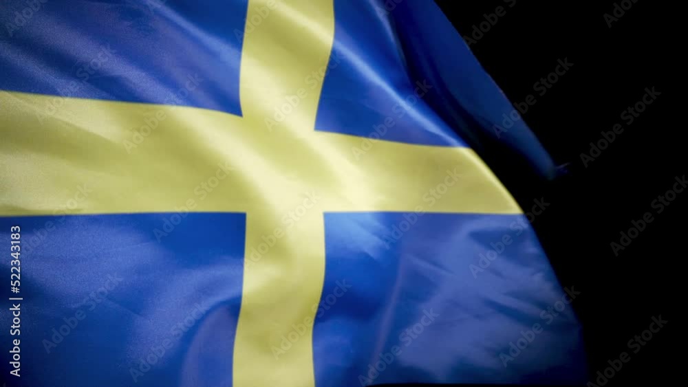 National Swedish Flag. Black background.
Swedish Flag is waving.
