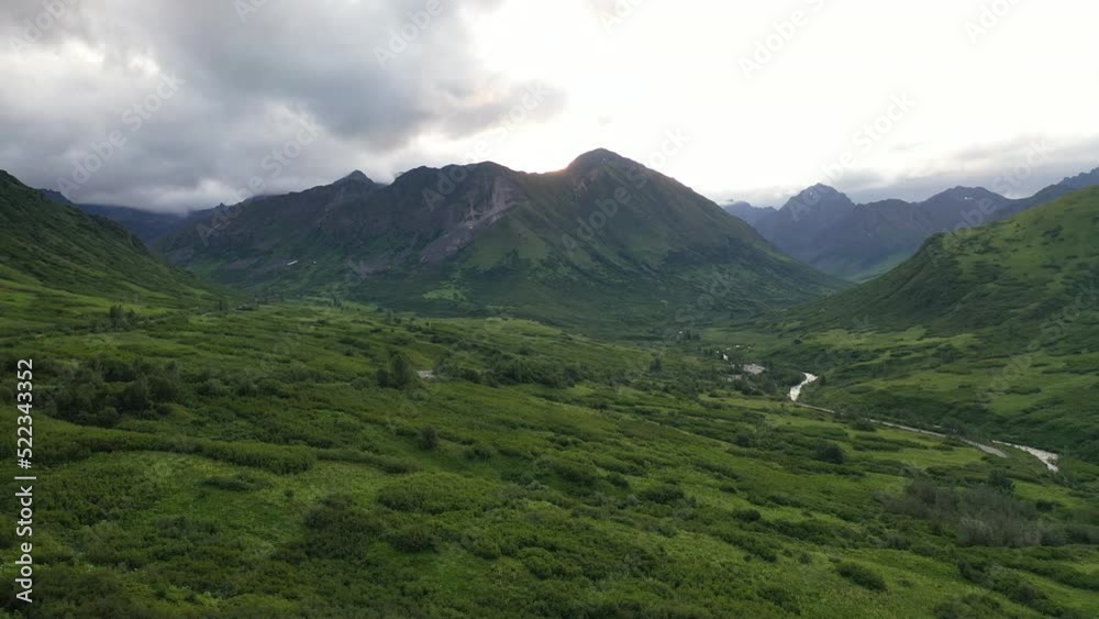Aerial view of Hatcher Pass, Alaska. Mountain Pass pass through the Talkeetna Mountains from above. Summer Alaskan landscape Aerial view of Hatcher Pass, Alaska. Mountain Pass pass through the Talkeetna Mountains from above. Summer Alaskan landscape