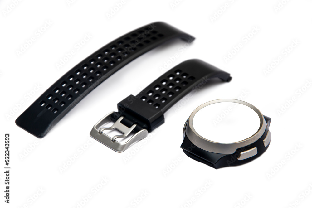 Diagonal view of black smartwatch broken into pieces on white isolated background Diagonal view of black smartwatch broken into pieces on white isolated background