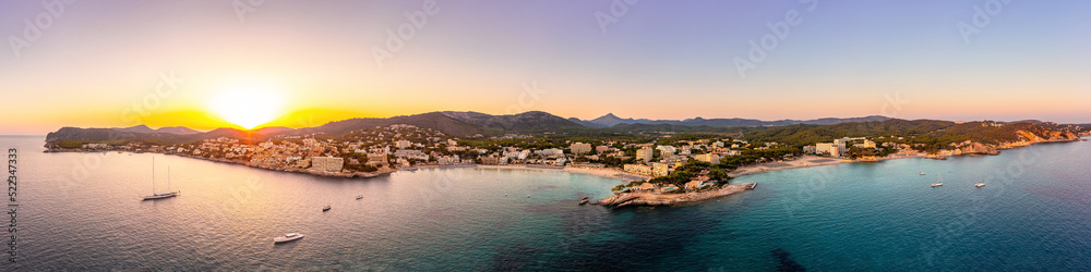 Panorama Aussicht auf die Küste von Mallorca, Cala Fornells und Paguera bei Sonnenuntergang, Aerial view with drone,  skyline at sunset, summer at mediterranean sea