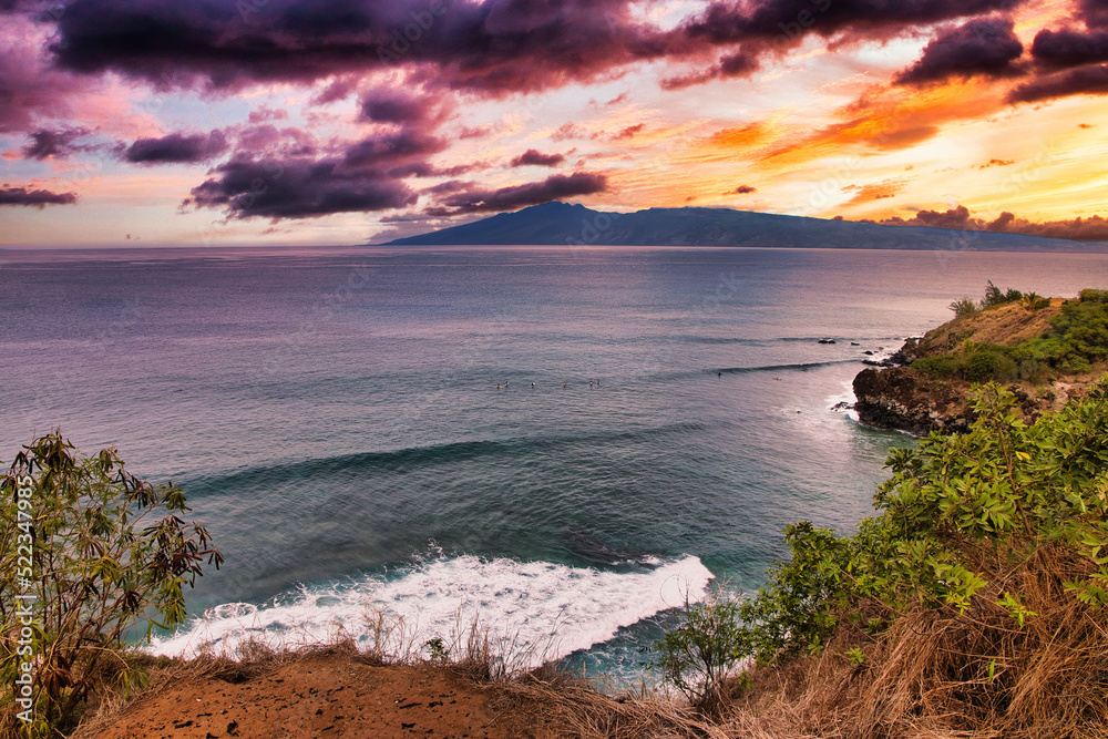 Beautiful sunset view of Molokai from Honolua Bay on Maui.