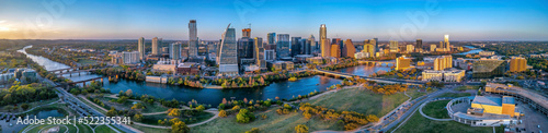 Panoramic cityscape of Austin  Texas near the Colorado River against the sunset skyline