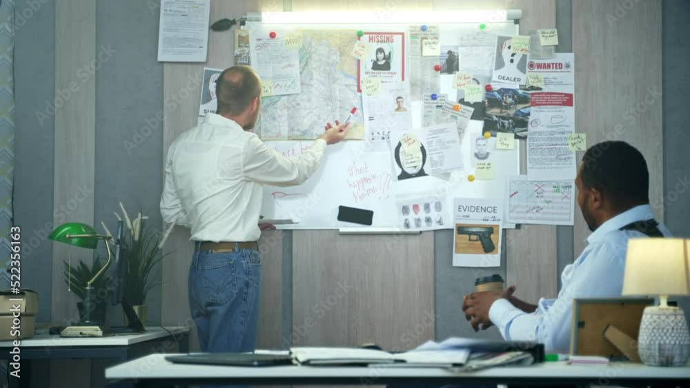 Diverse private detectives have reached a dead end on the investigation. FBI agents trying to find a new version of homicide case using photos, files and clues on board and deduction method. 4K 