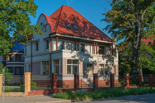 View of a villa Aron in the historic district of Amalienau (former prestigious suburb of Koenigsberg) on a sunny summer day, Kaliningrad, Russia photo