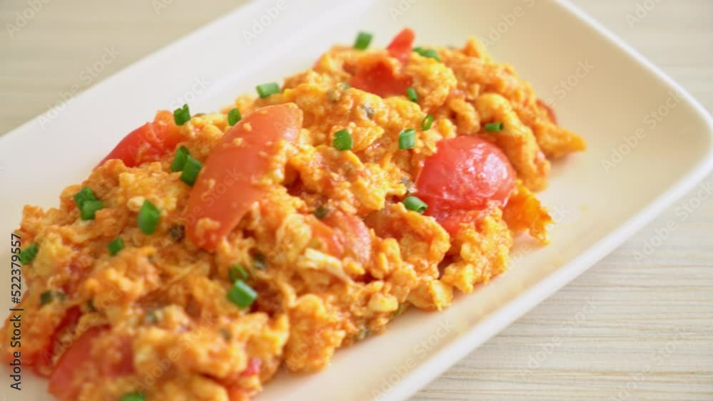 Stir-fried tomatoes with egg or Scrambled eggs with tomatoes - healthy food style Stir-fried tomatoes with egg or Scrambled eggs with tomatoes - healthy food style