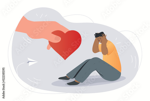 Concept of empathy. Hand holds out heart to crying young guy. Care and support. Kindness and benevolence, character calms man. Donation and help, share feelings. Cartoon flat vector illustration