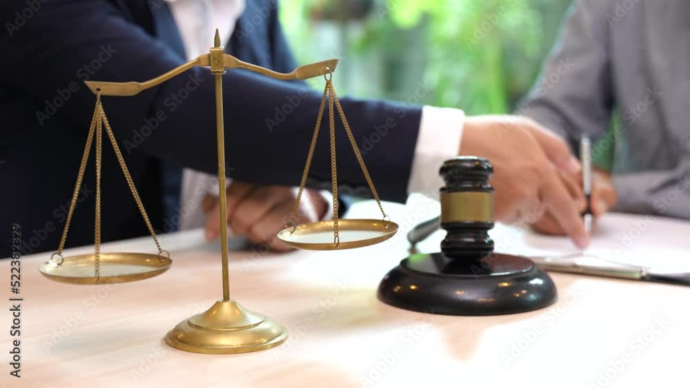 Judge gavel with Justice lawyers having team Concepts of Law and Legal services