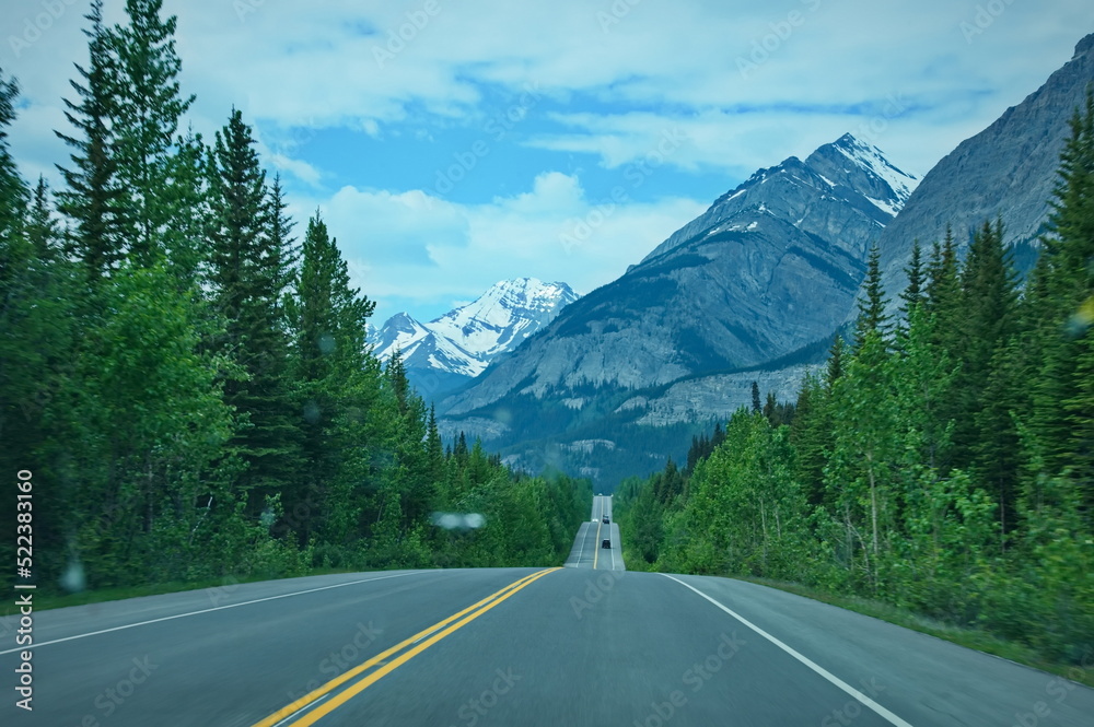 Road trip in Alberta, Canada. View through the windshield