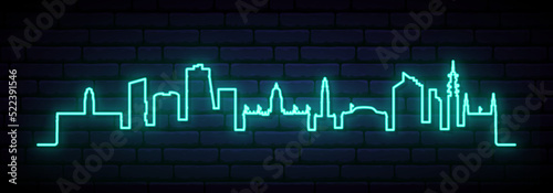 Blue neon skyline of Leeds. Bright Leeds City long banner. Vector illustration.