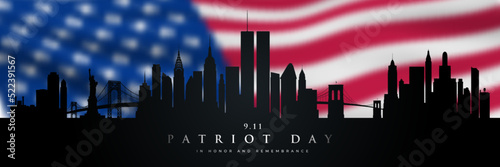 Patriot day design with American blurred flag and panorama New York City skyline. 11 September, 2001 attacks. Long horizontal banner.