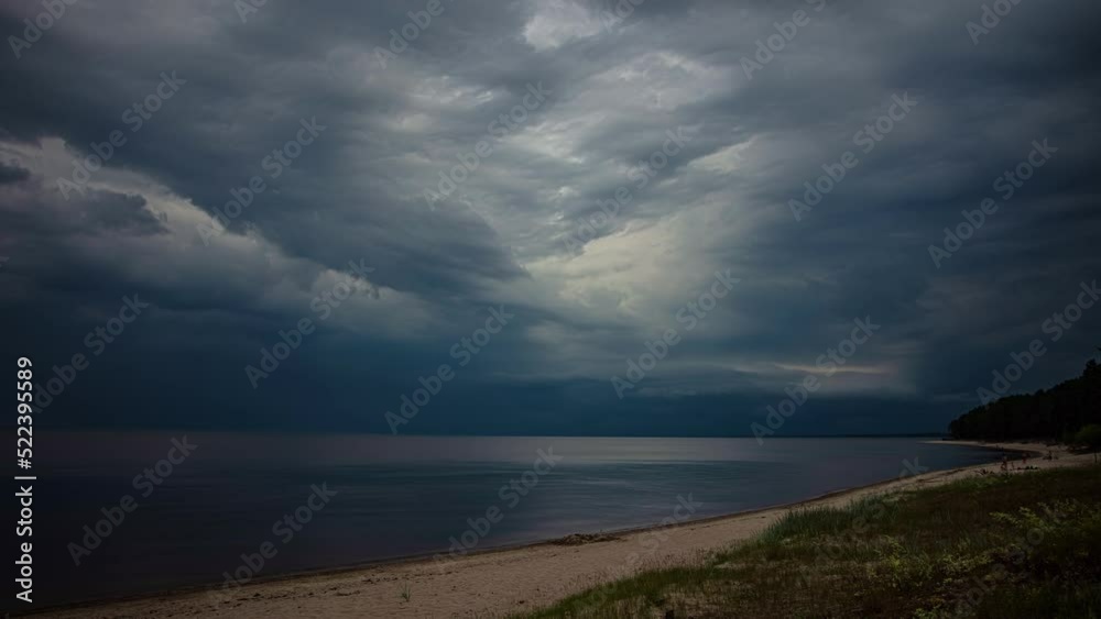People Swimming And Relaxing At The Beach Under Cloudy Sky. - Time Lapse