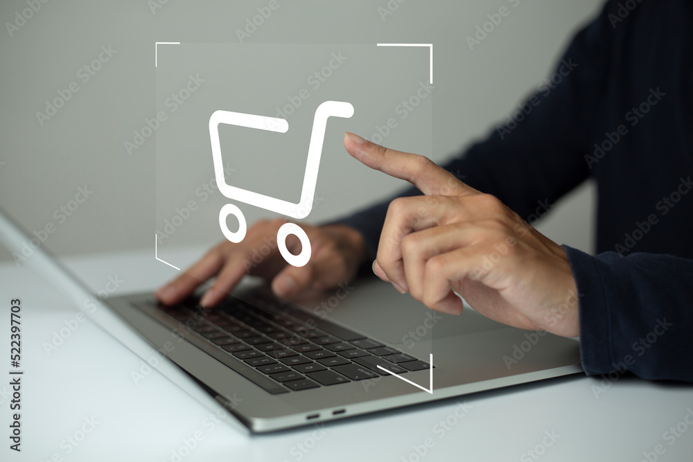 shopper using laptop and touch virtual screen online shopping. And online payment option or digital wallet online transaction concept. shopper using laptop and touch virtual screen online shopping. And online payment option or digital wallet online transaction concept.