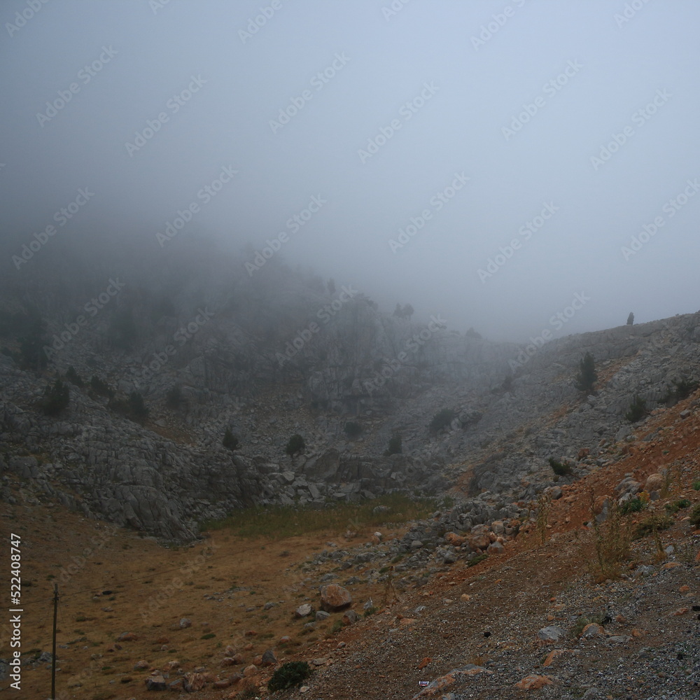 Obraz premium summer smoke on the mountains