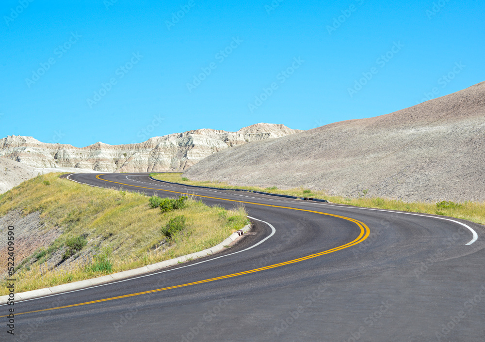 Isolated road through Badlands National Park in South Dakota