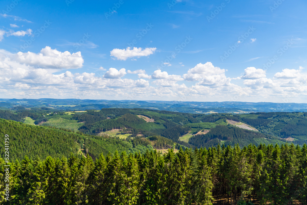 Obraz premium Landscape at Schomberg in Sauerland. Nature with forests and hiking trails near Sundern on the Lennegebirge. 