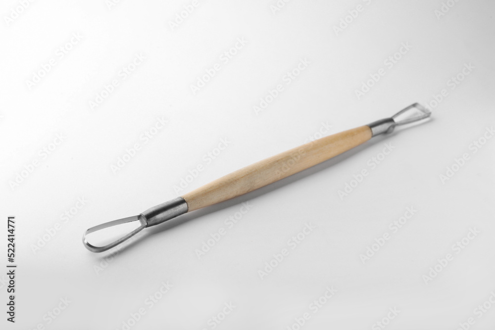 Ribbon tool for clay modeling on white background Ribbon tool for clay modeling on white background