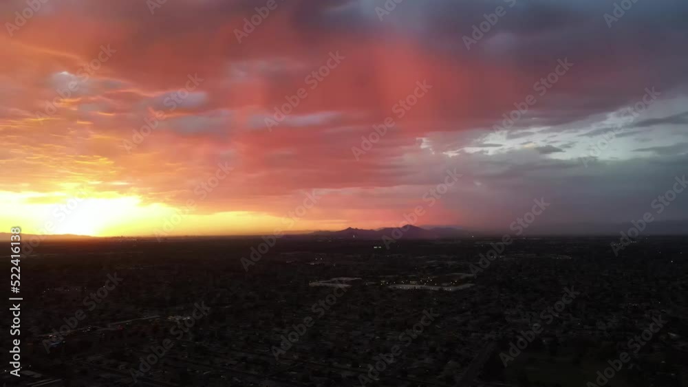 4K Colorful sunset in arizona with camelback mountain in the background, pink yellow and orange clouds 4K Colorful sunset in arizona with camelback mountain in the background, pink yellow and orange clouds