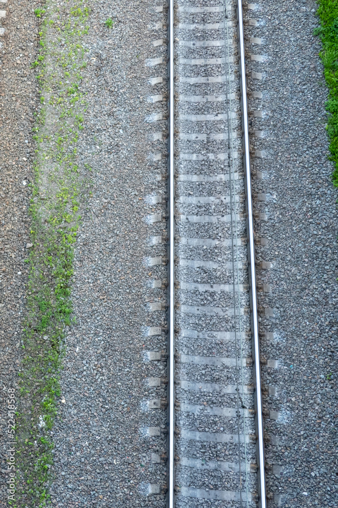 railway tracks on the road, view from above on the railway road, travelling, direction of way railway tracks on the road, view from above on the railway road, travelling, direction of way