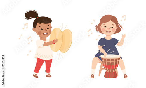 Set of adorable kids playing musical instruments. Cute girls playing cymbals and drum percussion instruments cartoon vector illustration