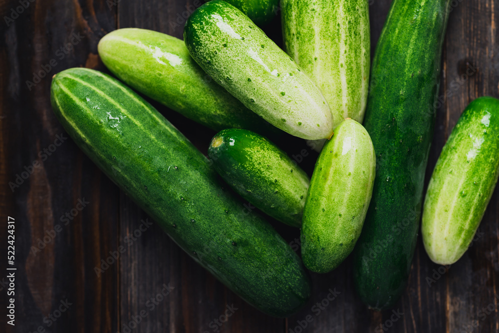 Fresh cucumber on wooden background, Organic vegetables from local farmer market Fresh cucumber on wooden background, Organic vegetables from local farmer market