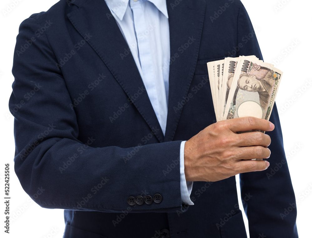 Man hand holding 10000 Japanese Yen banknote Man hand holding 10000 Japanese Yen banknote