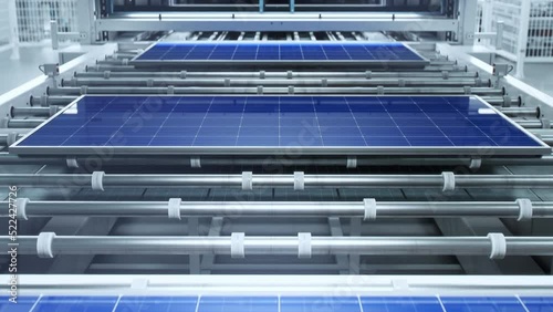 Top View of Solar Panels on Moving on Productions Line Toward Camera. Finished Solar Panles on the Last Step of Manufacturing Process at a Bright Modern Factory. photo