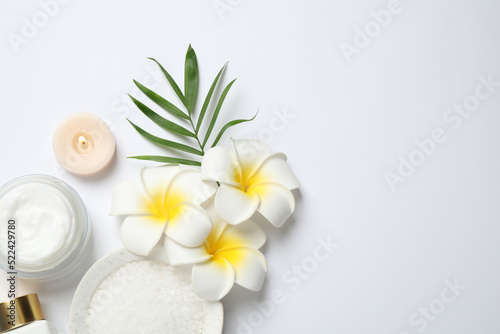 Composition with bath salt on white background, top view. Spa treatment