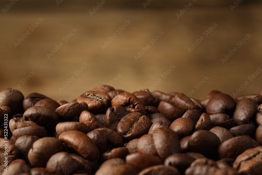 Heap of aromatic roasted coffee beans, closeup Heap of aromatic roasted coffee beans, closeup