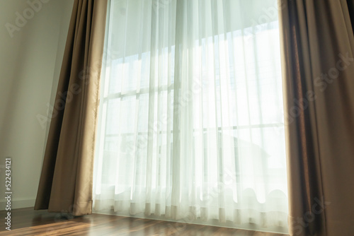 Curtain window interior decoration in living room on sunny day with sunlight