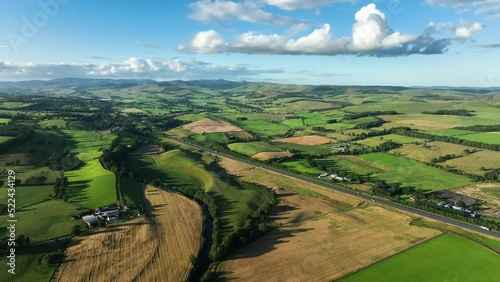 aerial view of the scottish borders countryside near moffat on a blue sky day with clouds during a day in the summer