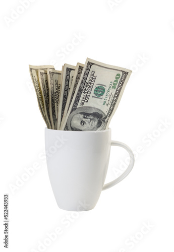 Banknote in a coffee cup isolated.