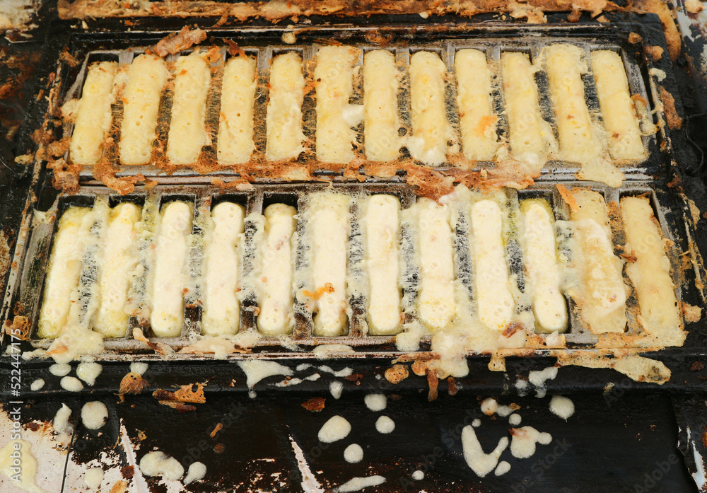 Bandros dough on the grill, Kue Pancong, Gandos or Bandros is an ...