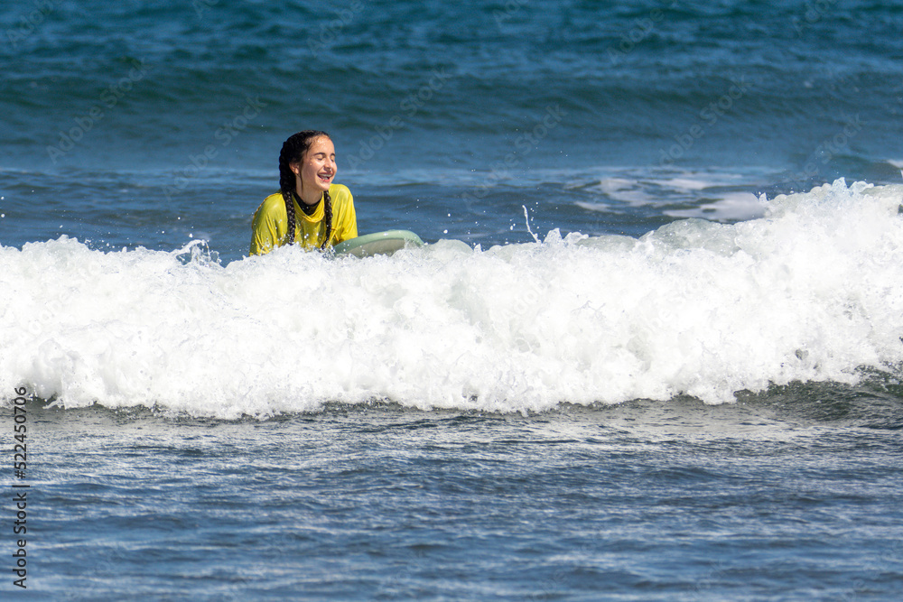 Smiley and happy woman surfing Smiley and happy woman surfing