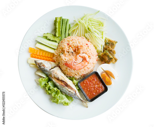 Fried rice with chilli paste and fish on table flat ray photo