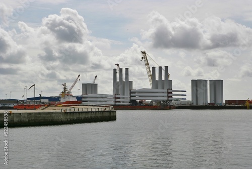 View of wind turbine components on the harbour dock, Esbjerg, Jutland, Denmark photo