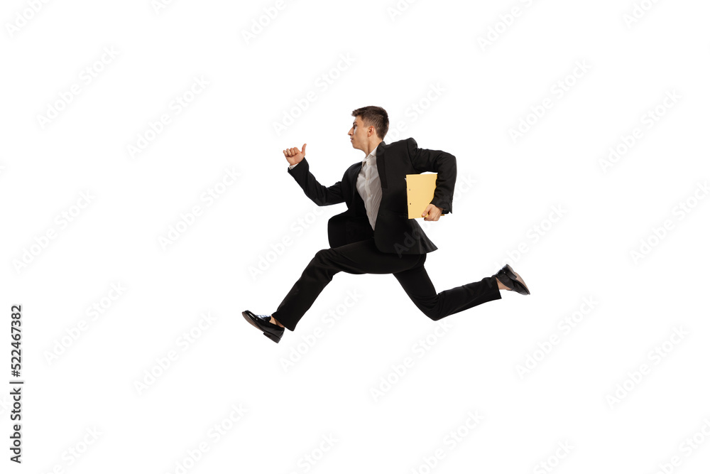 Late for work. Young office worker in business suit running isolated over white background. Finance, aspiration, business, job concept.