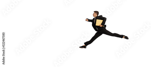Late for work. Young office worker in business suit running isolated over white background. Finance, aspiration, business, job concept.