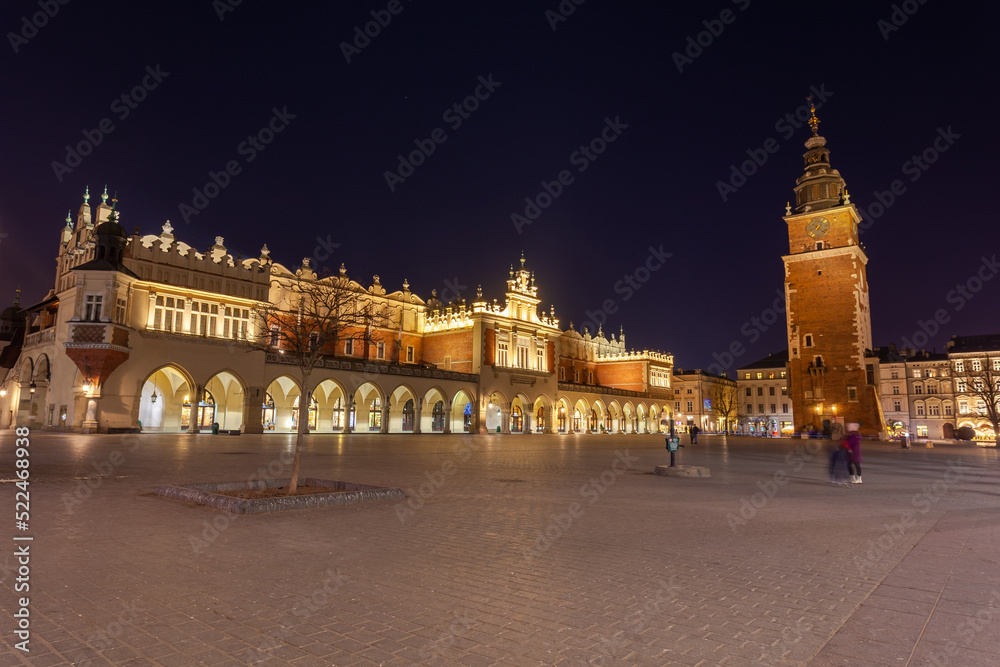 Old town square in Krakow at night, Poland. St. Marys Basilica