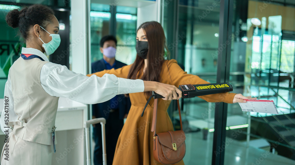 ..businesswoman undergoing security check before the flight. Concept of airport Security... ..businesswoman undergoing security check before the flight. Concept of airport Security...