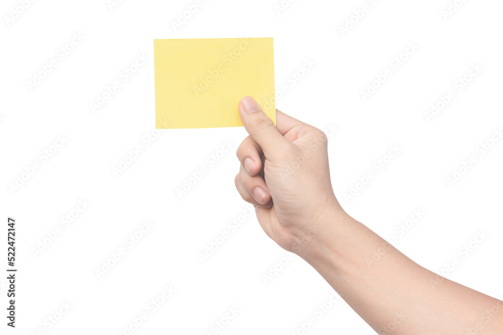 Hand holding yellow paper isolated on white with clipping path.