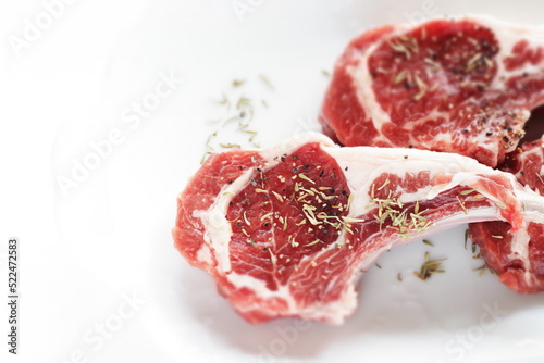 Raw lamb chop and herbal for gourmet cooking image