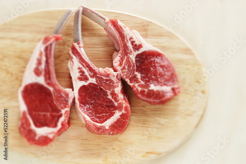 Raw lamb chop and herbal for gourmet cooking image