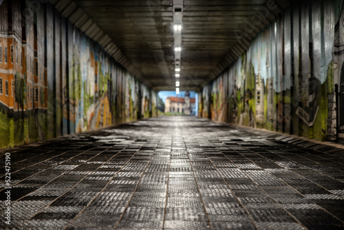 Long underpass with graffitti on walls in town Liptovsky Hradok, Slovakia photo