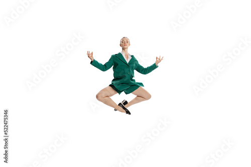 Mental health. Stylish young woman in business style outfit in motion isolated over white background. Business, job concept.