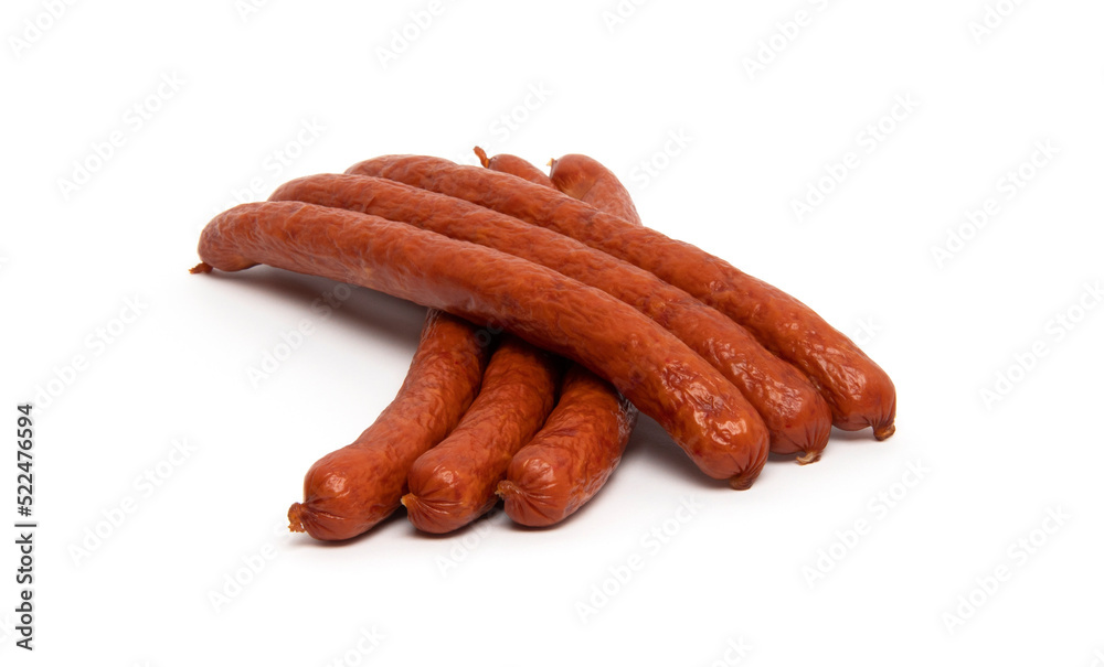 Smoked grilled thin Pork Sausages, close-up, isolated on white background