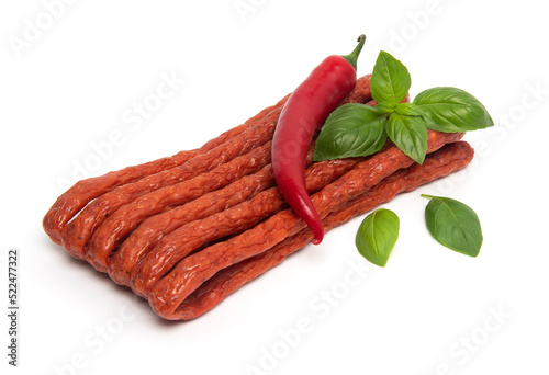 Thin Dry Smoked Pork or beef meat Polish Kabanos sausages Isolated on white background
